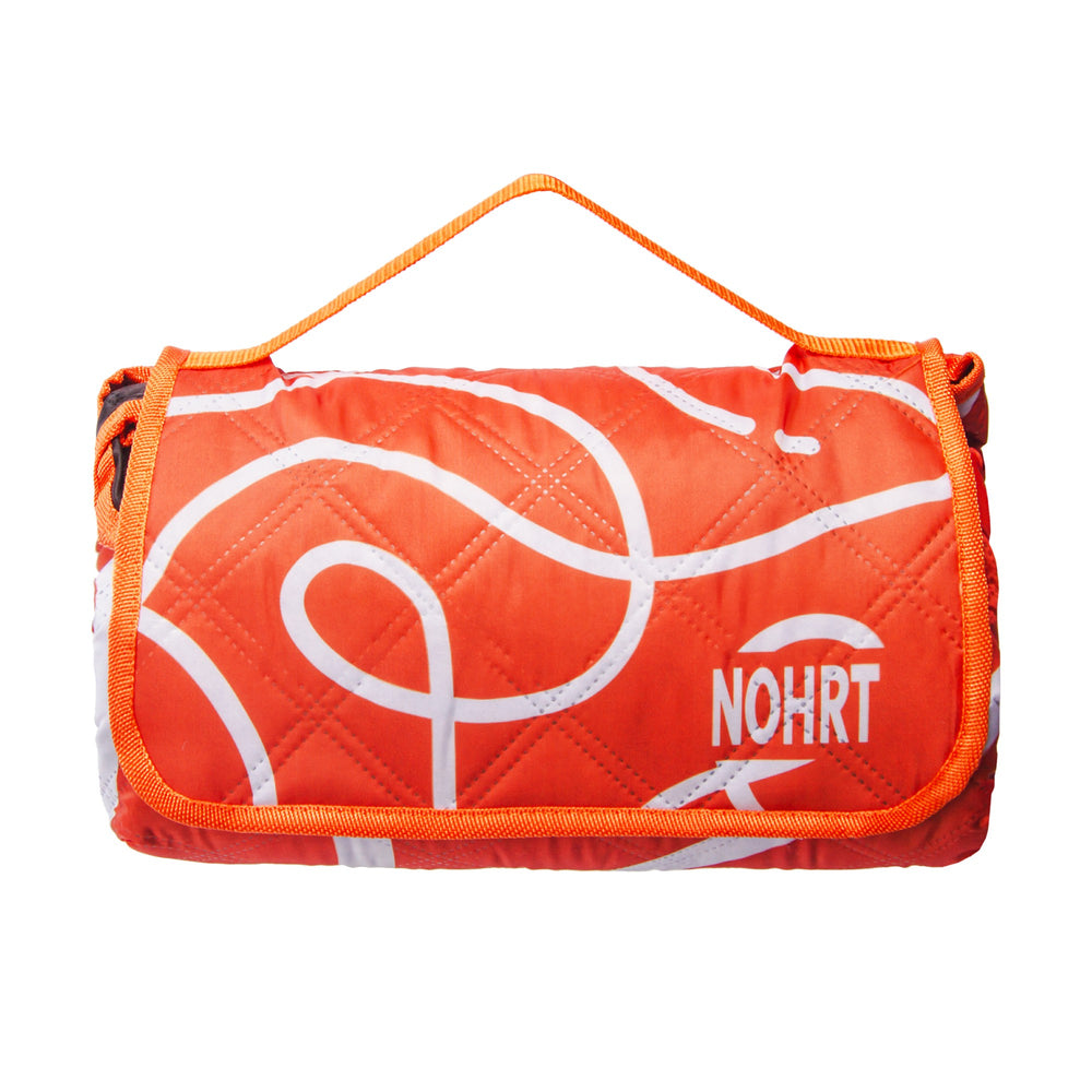 Loop blanket folded – perfect for travel, picnics and outdoor relaxation