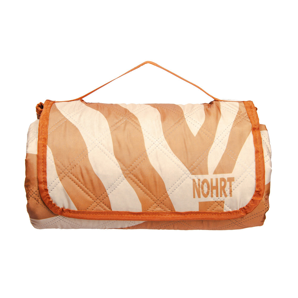 Folded Wild picnic blanket – compact, yet full of personality